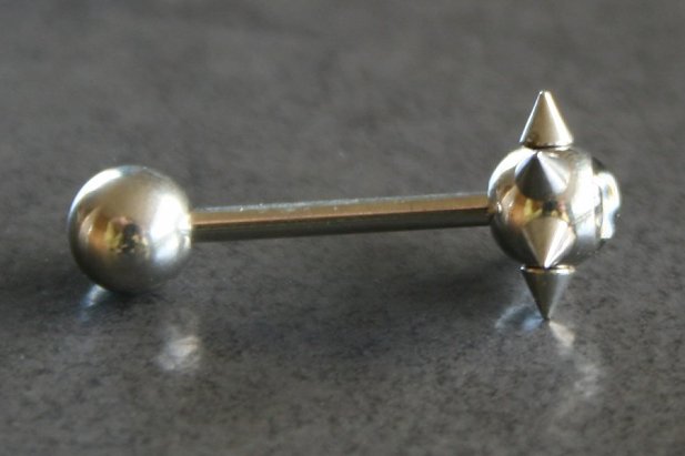 Pimp Logo Spike Tongue Bar